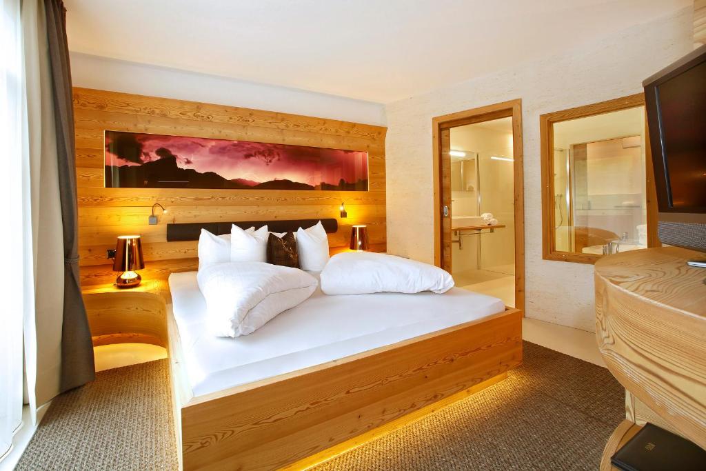 Postel nebo postele na pokoji v ubytování Hotel Valpudra
