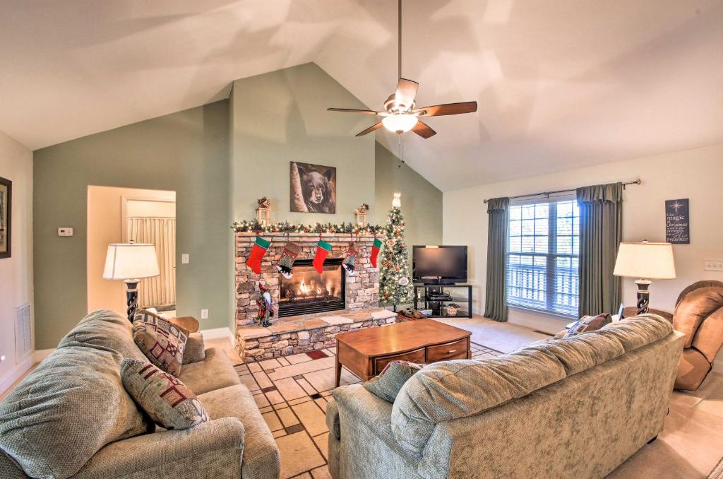 a living room with two couches and a fireplace at Blairsville Home with Deck and Stunning Mountain Views in Hood
