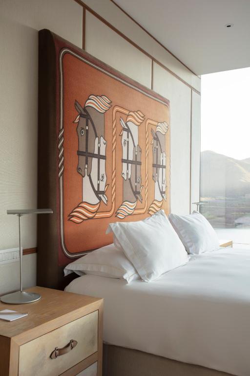 Uma cama ou camas num quarto em Vik Chile