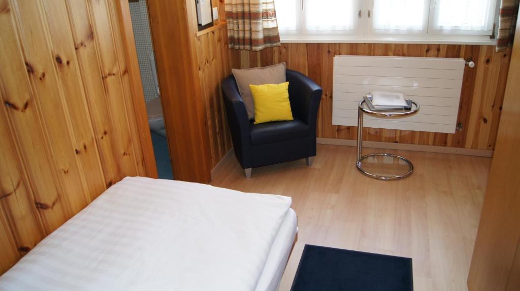 Postel nebo postele na pokoji v ubytování Hotel Alpina