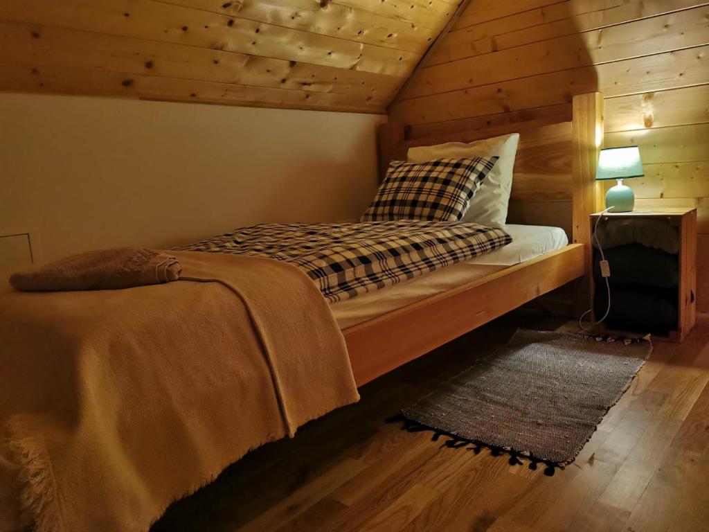 Postel nebo postele na pokoji v ubytování Apartament Zielone Okiennice