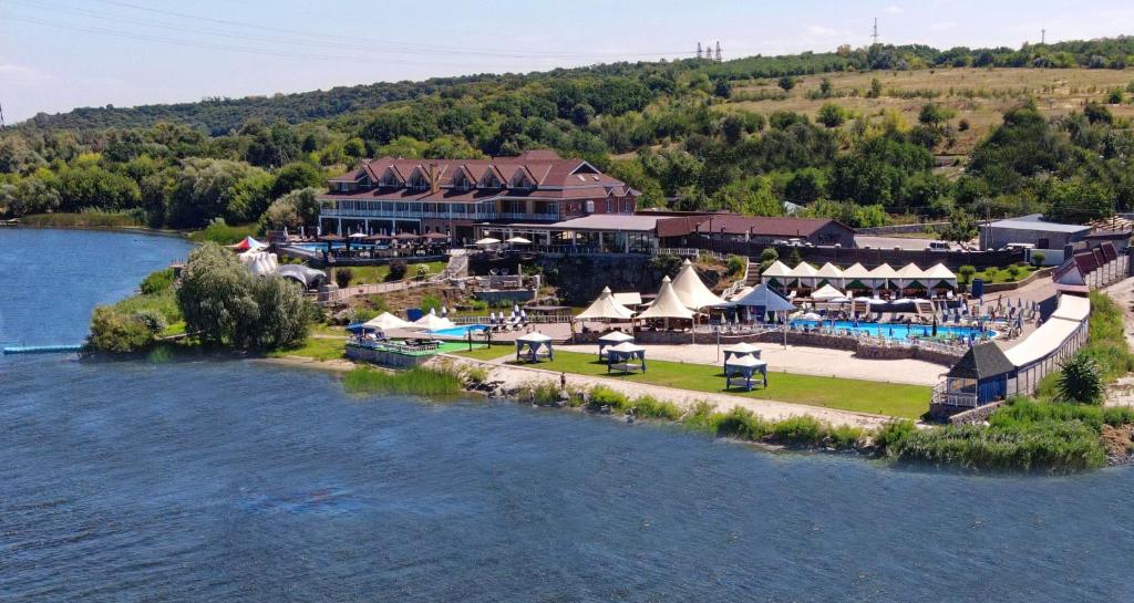 an aerial view of a resort next to a river at Спа-Готель Потоки Хауз in Kam”yani Potoky