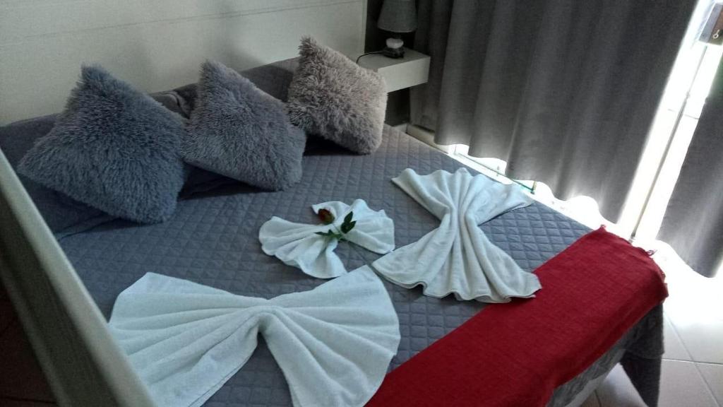 Säng eller sängar i ett rum på LOFT NA PRAINHA EM Arraial do Cabo