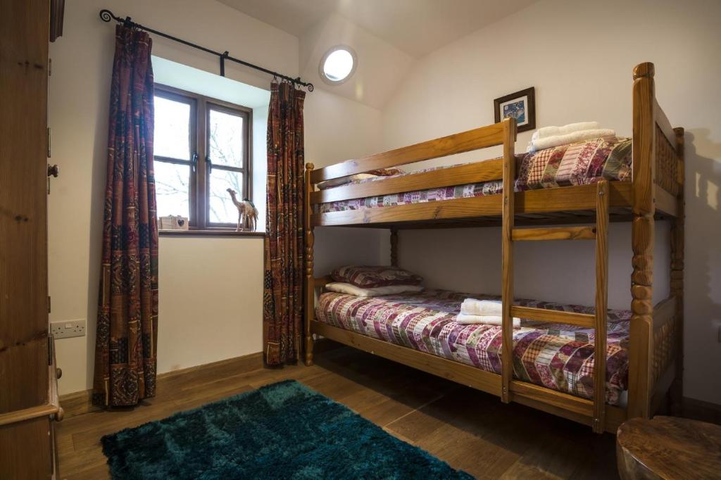 Postel nebo postele na pokoji v ubytování Orchard Cottage - Luxurious Barn Conversion - Beavers Hill