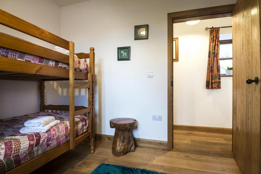 Postel nebo postele na pokoji v ubytování Orchard Cottage - Luxurious Barn Conversion - Beavers Hill