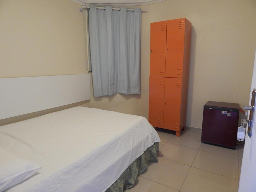 Postel nebo postele na pokoji v ubytování Good Hostel & Pousada
