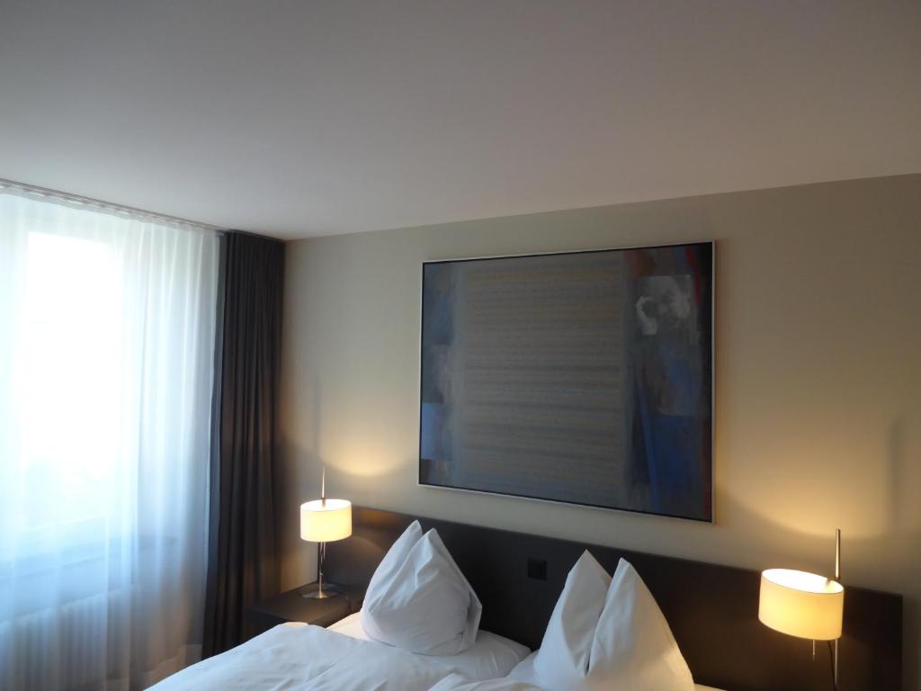 Llit o llits en una habitació de Altstadt Hotel