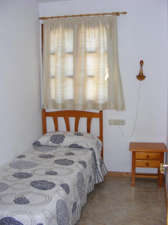 Posteľ alebo postele v izbe v ubytovaní Apartaments l'Arrel