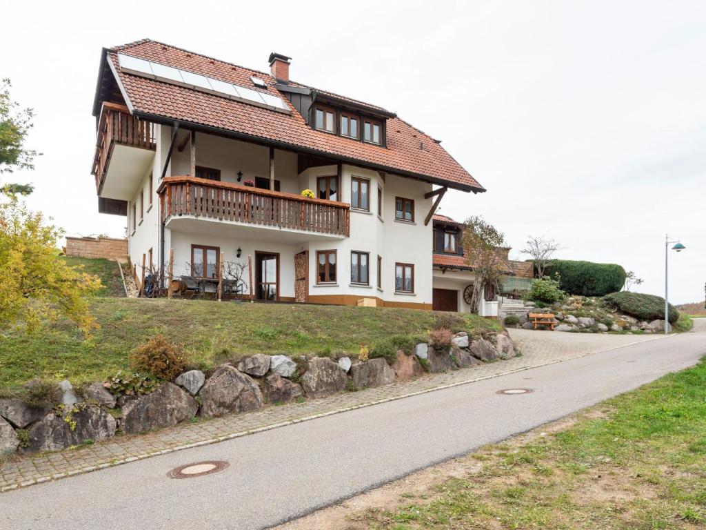 a house on the side of a road at Apartment on the edge of the forest in Kleines Wiesental