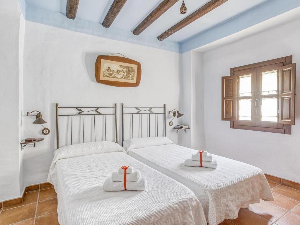 Łóżko lub łóżka w pokoju w obiekcie Villa in Carcabuey near Sierras Subbeticas Park