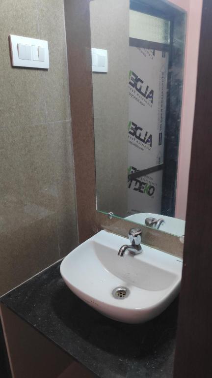 Koupelna v ubytování Bandekar Home Stay