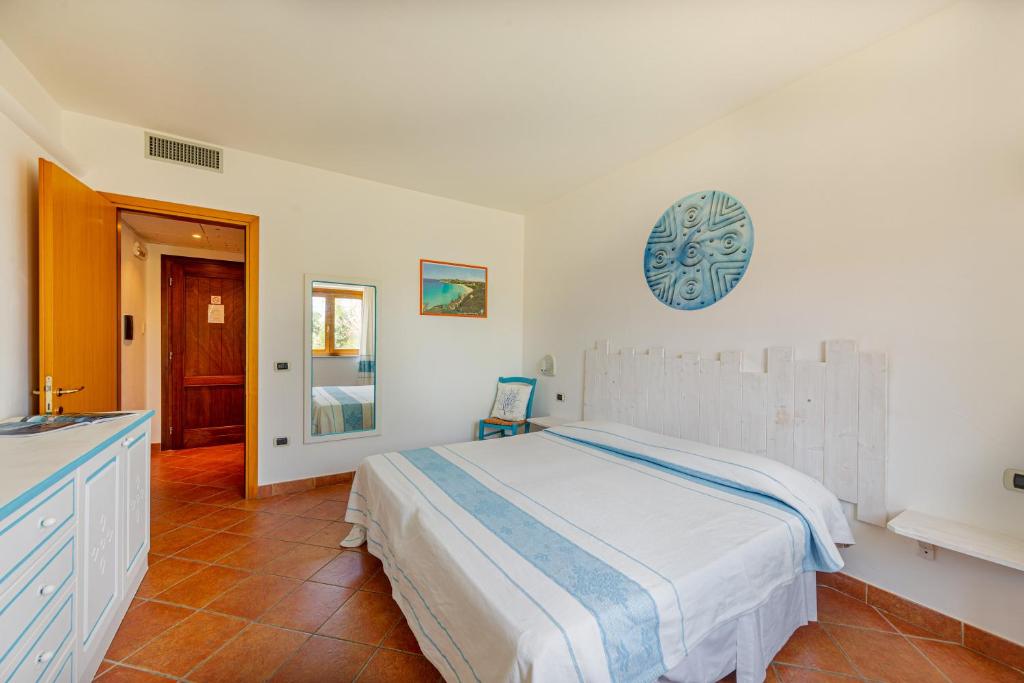 Postel nebo postele na pokoji v ubytování LH Hotel La Funtana