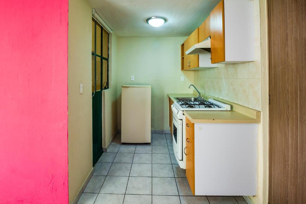 Kuchyň nebo kuchyňský kout v ubytování Suites Navata