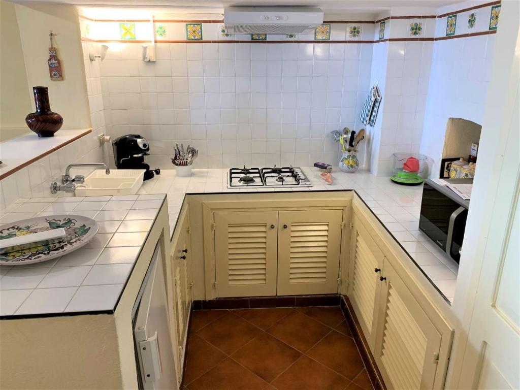 Kuchyň nebo kuchyňský kout v ubytování Casa Papuzza e Casa Lucilla