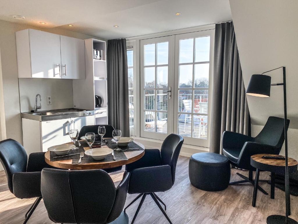 Posezení v ubytování Prachtig Appartement dichtbij strand DO07