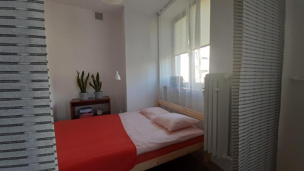 Posteľ alebo postele v izbe v ubytovaní Lovely Jubbly Apartment