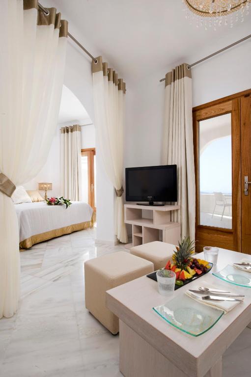 TV a/nebo společenská místnost v ubytování Gold Suites - Small Luxury Hotels of the World