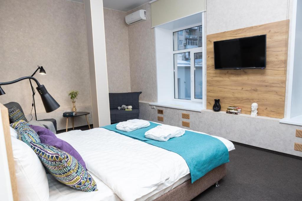 Cama ou camas em um quarto em Арт-отель Маяковский
