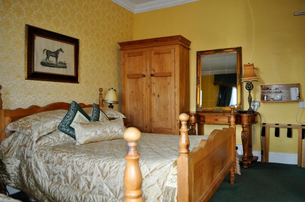 Postel nebo postele na pokoji v ubytování Highfield House Guesthouse
