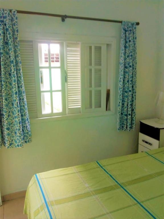  Quarto com wifi a 4 min a pé da praia em Bertioga