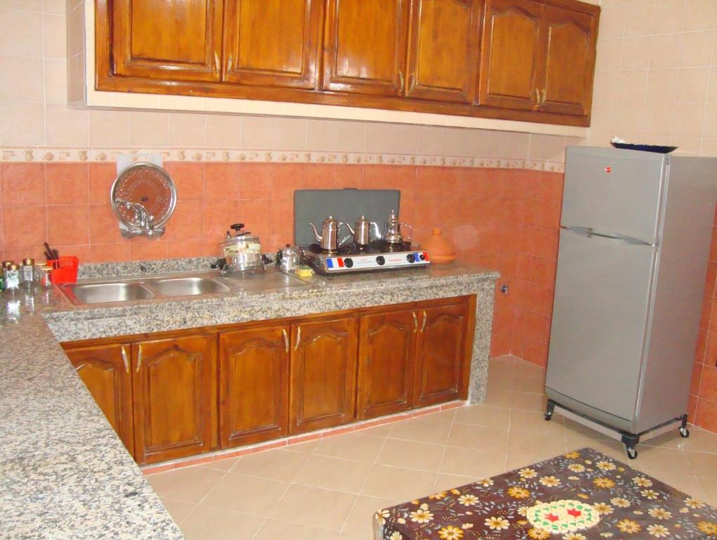 Kuchyň nebo kuchyňský kout v ubytování Yasmine Appartements