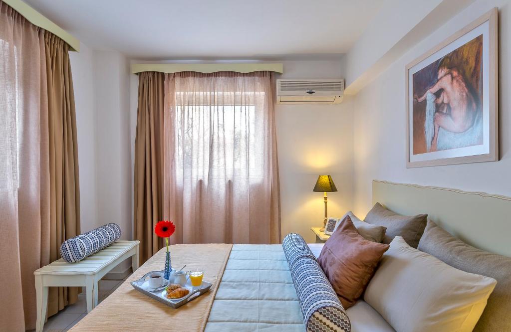 Postel nebo postele na pokoji v ubytování Agrimia Holiday Apartments