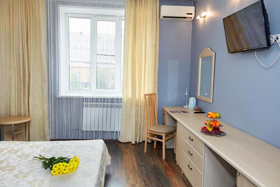 TV a/nebo společenská místnost v ubytování Hotel Chalpan