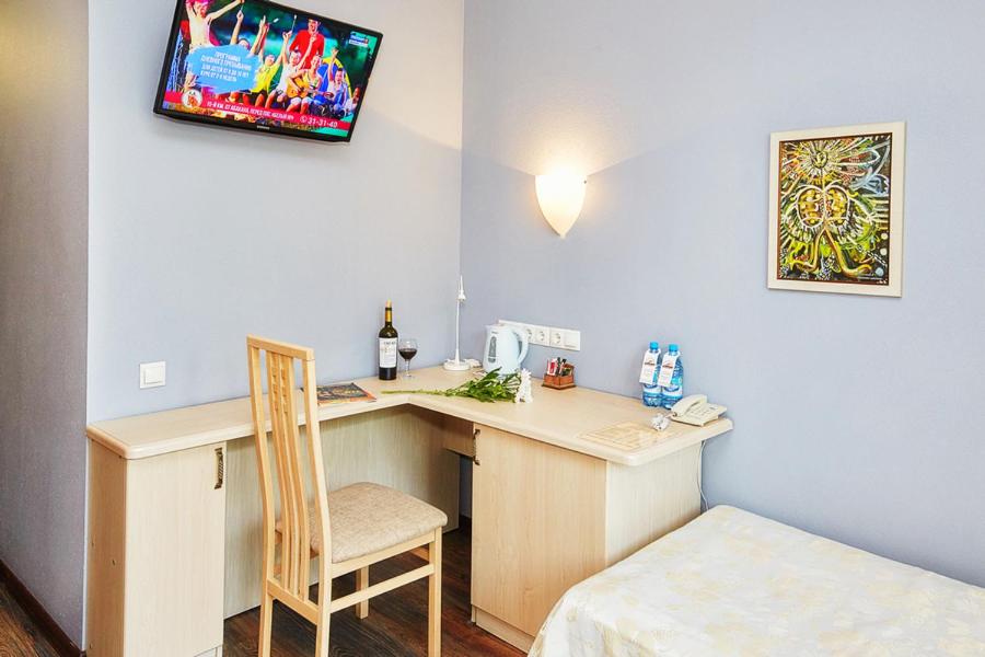 Postel nebo postele na pokoji v ubytování Hotel Chalpan