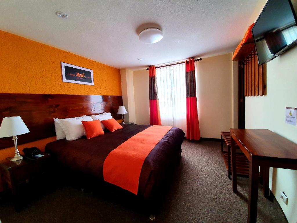 Postel nebo postele na pokoji v ubytování Vita Hoteles Colca