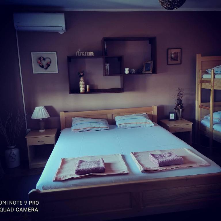 Postel nebo postele na pokoji v ubytování HostelChe Guest House