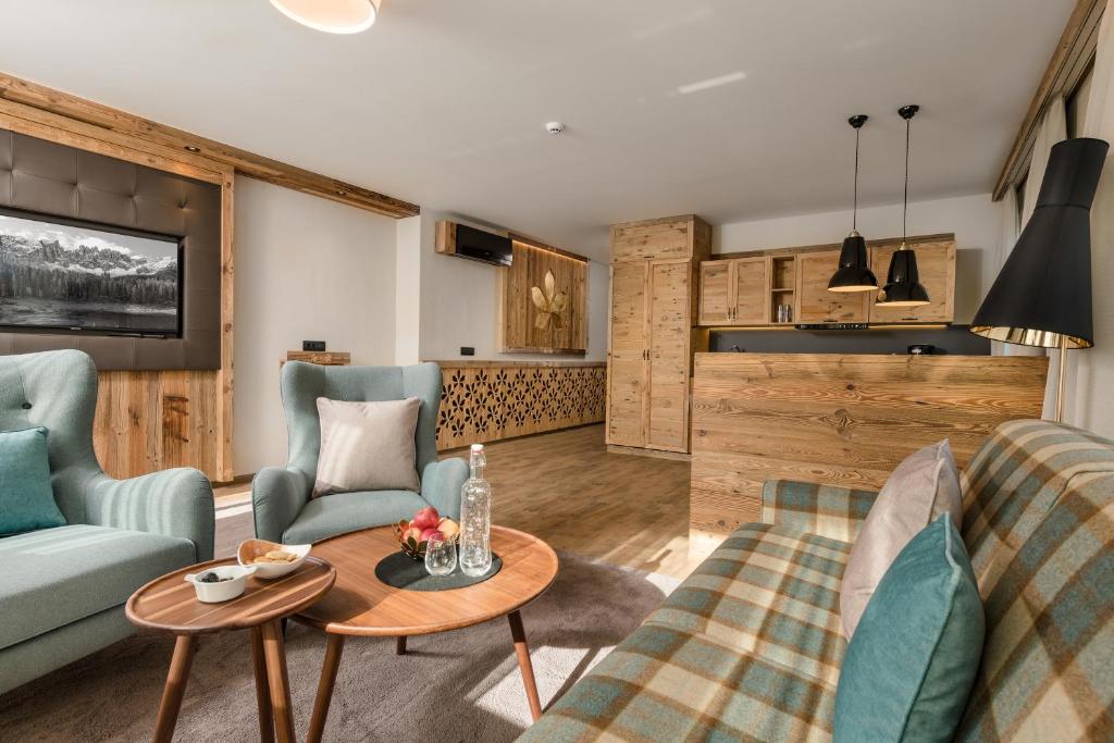 Posezení v ubytování MONDI Hotel Tscherms