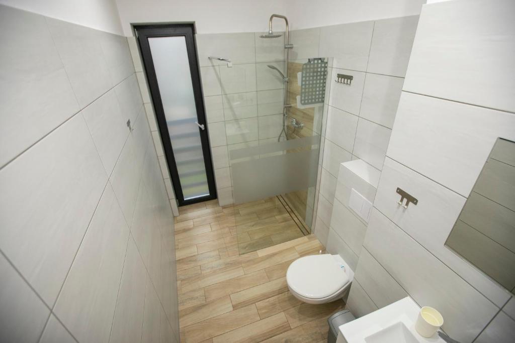 Koupelna v ubytování Apartamenty PIER