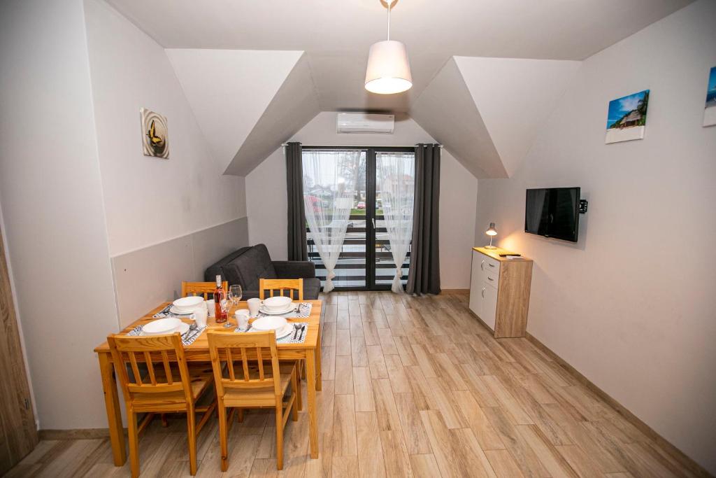 TV a/nebo společenská místnost v ubytování Apartamenty PIER
