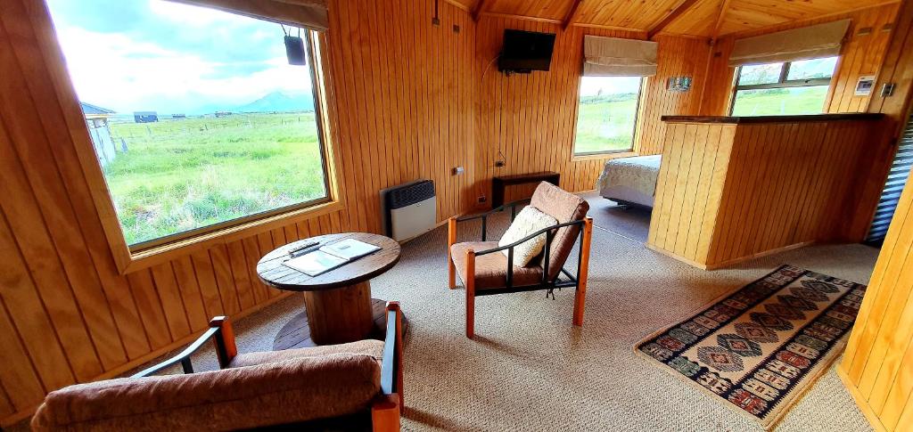 Uma área de estar em Cabañas y Casa Kauken