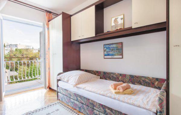 Posteľ alebo postele v izbe v ubytovaní Apartments MM