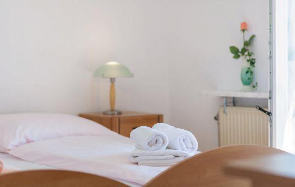 Posteľ alebo postele v izbe v ubytovaní Apartments MM
