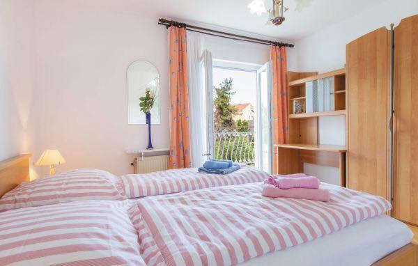 Posteľ alebo postele v izbe v ubytovaní Apartments MM