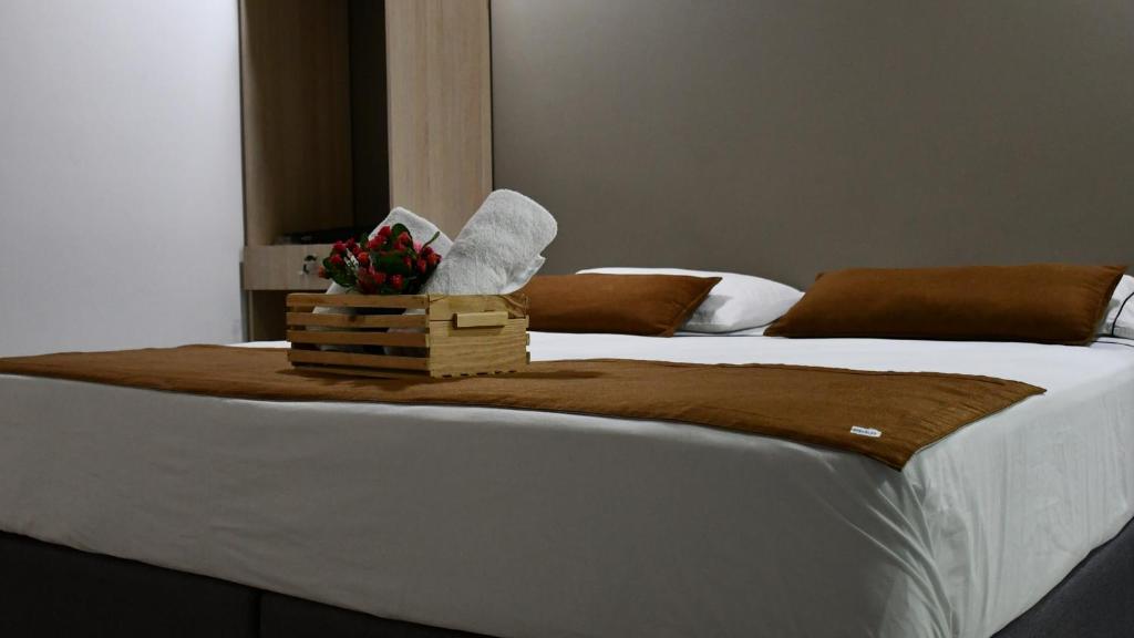 Postel nebo postele na pokoji v ubytování Hotel Boutique Plaza
