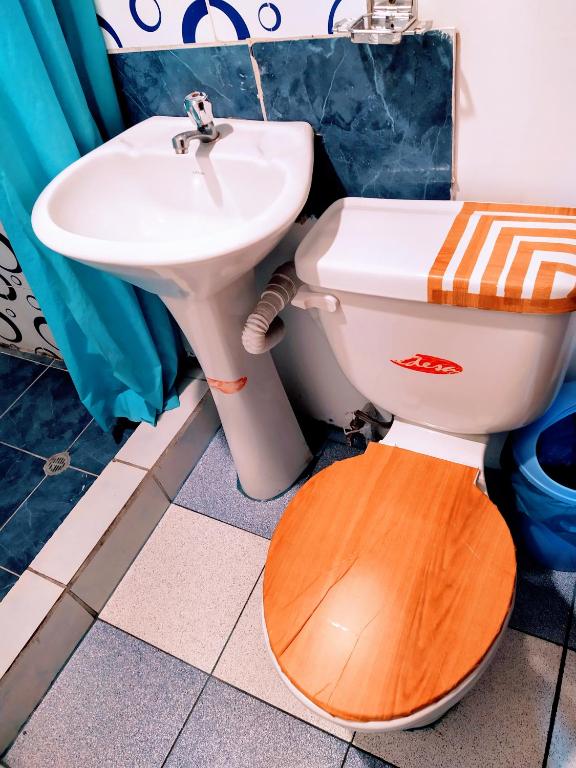 Koupelna v ubytování Hostal Latitud Ecuem