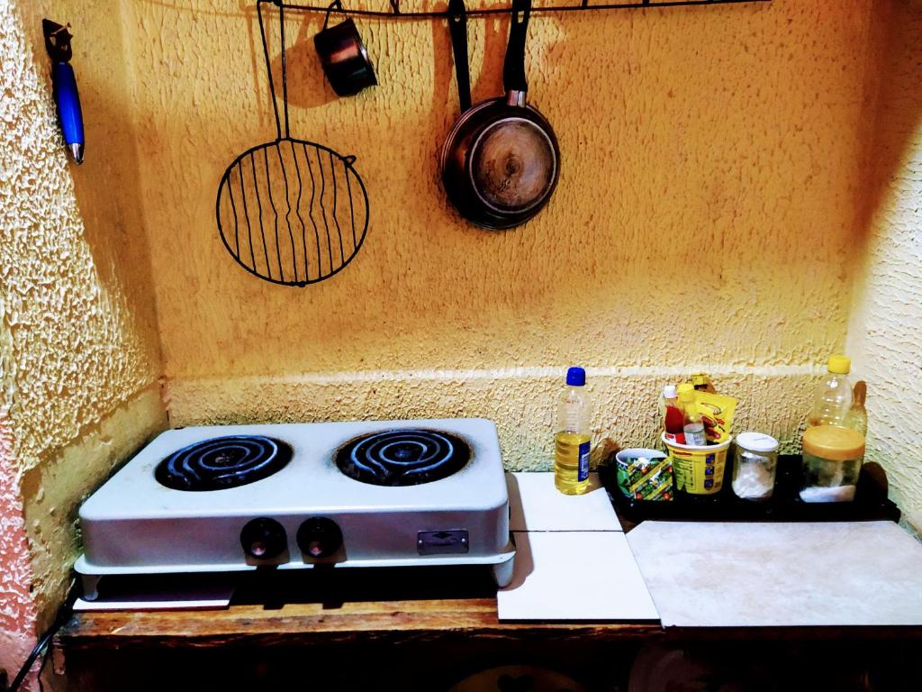 Kuchyň nebo kuchyňský kout v ubytování Hostal Latitud Ecuem