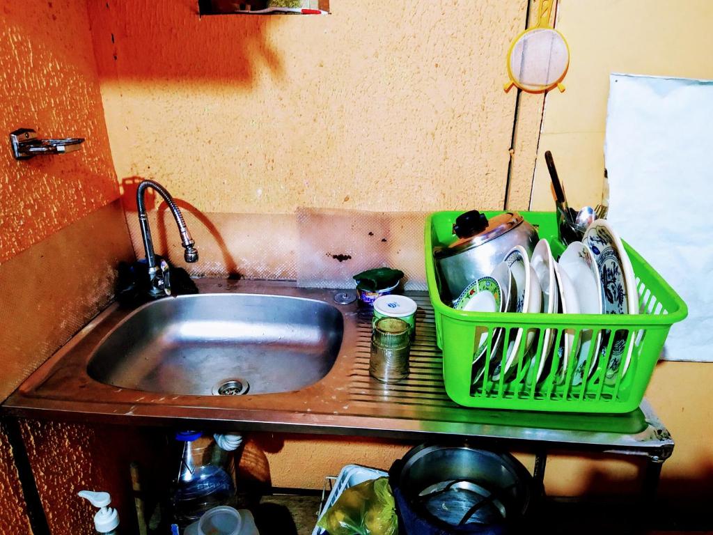 Kuchyň nebo kuchyňský kout v ubytování Hostal Latitud Ecuem