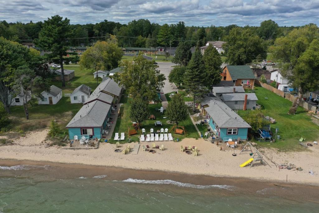 an aerial view of a house on the beach at Paradise Beach resort in Tawas City