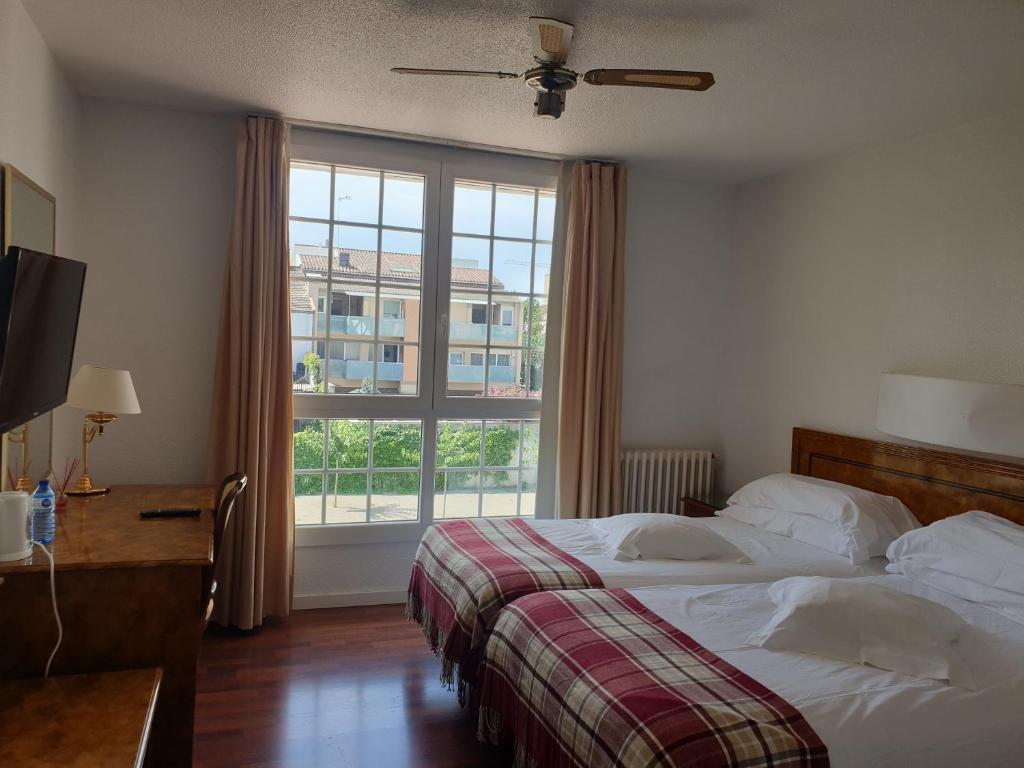 Postel nebo postele na pokoji v ubytování Hotel Pintor Marsà