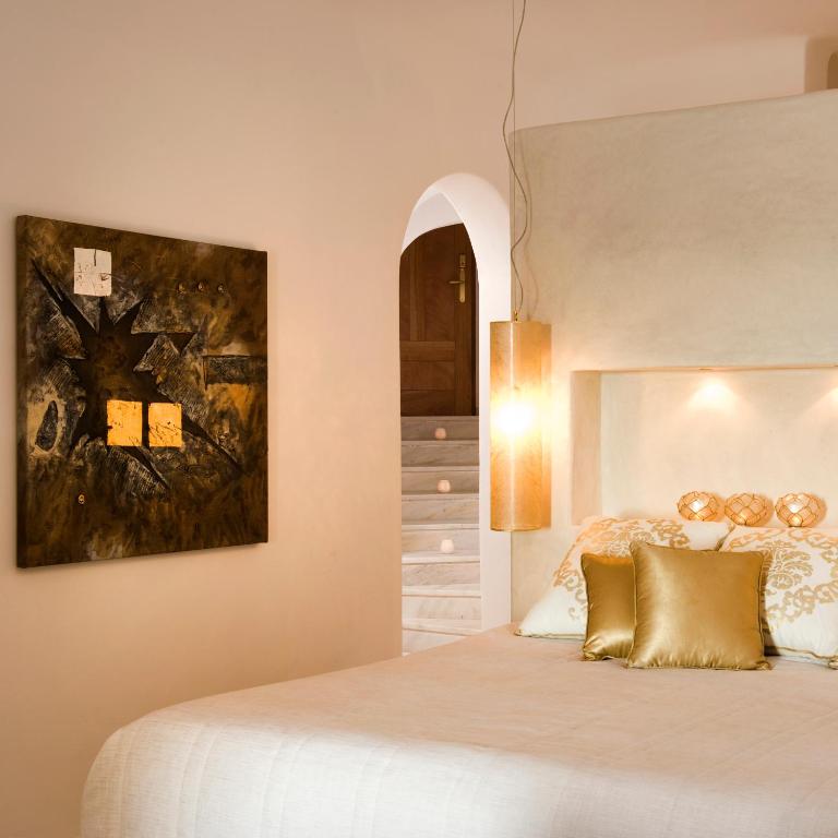 Postel nebo postele na pokoji v ubytování Gold Suites - Small Luxury Hotels of the World