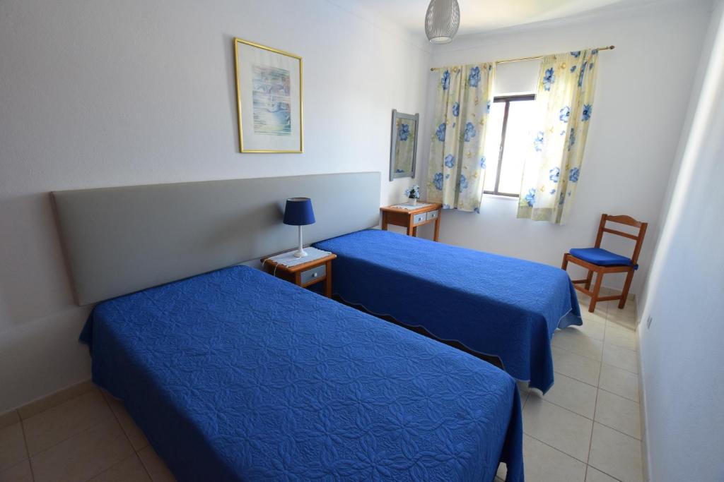 Postel nebo postele na pokoji v ubytování Apartamentos Carruna