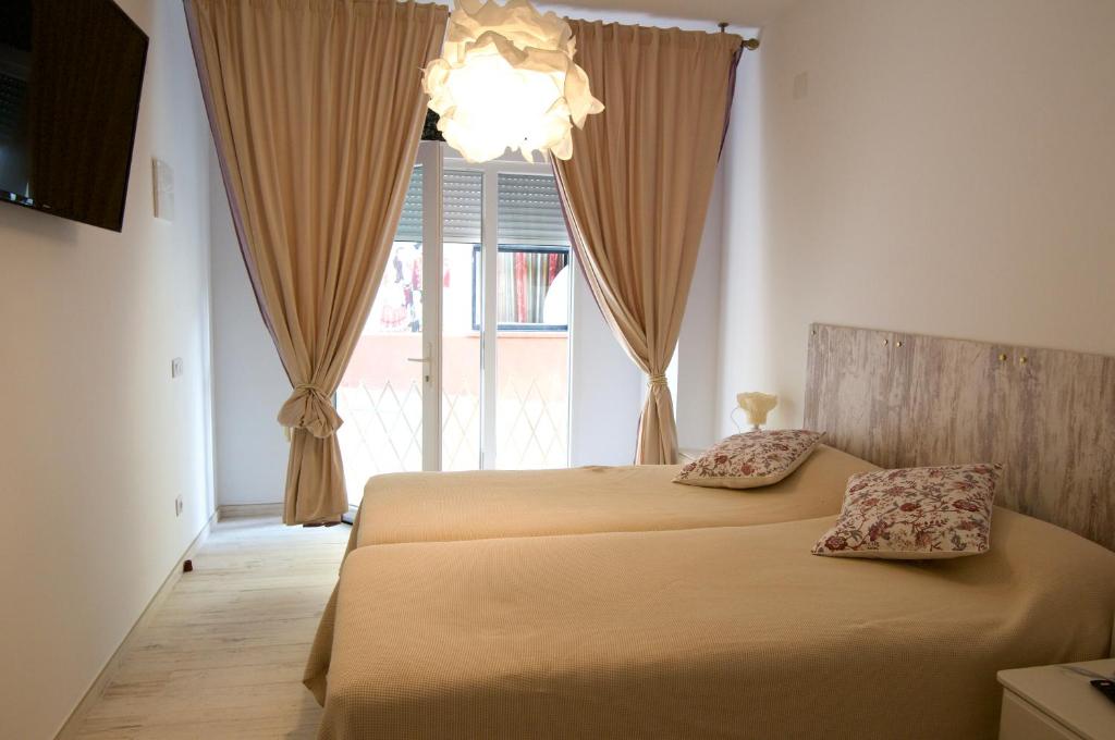 Postel nebo postele na pokoji v ubytování Loft Valentia Ifach Calpe