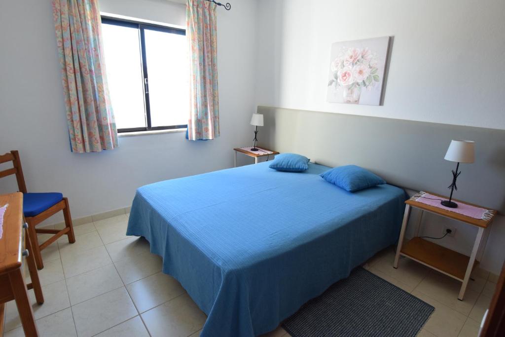 Postel nebo postele na pokoji v ubytování Apartamentos Carruna