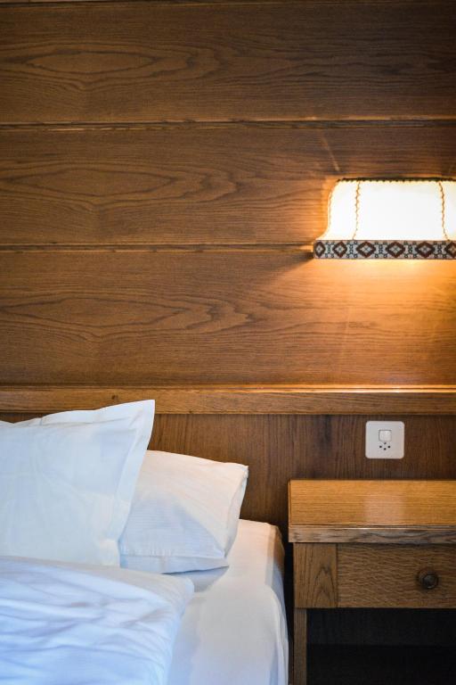Postel nebo postele na pokoji v ubytování Sonnenhotel Soldanella Sonneck