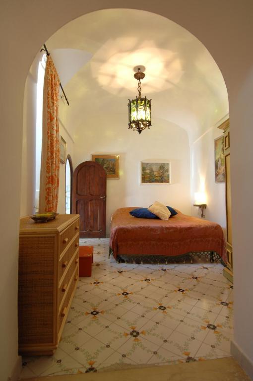 Кровать или кровати в номере Casa Bouganville