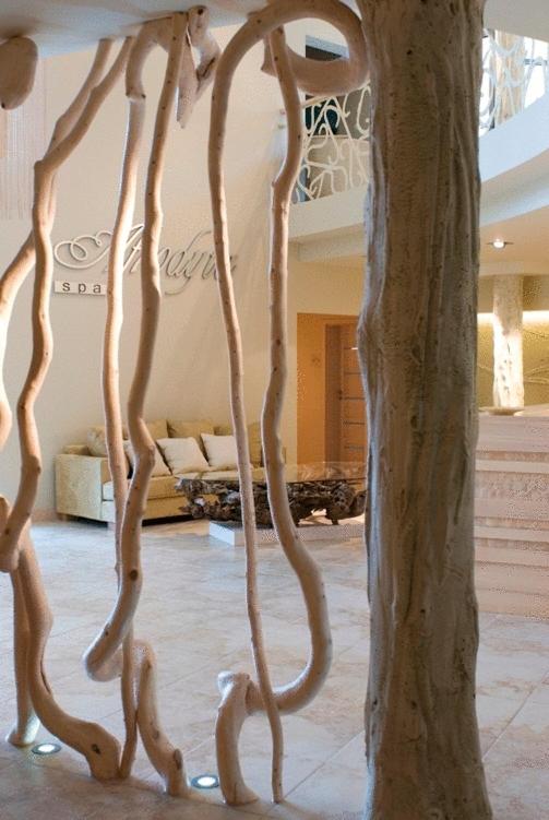 Artistic wooden decor in a spa lobby with a modern design.